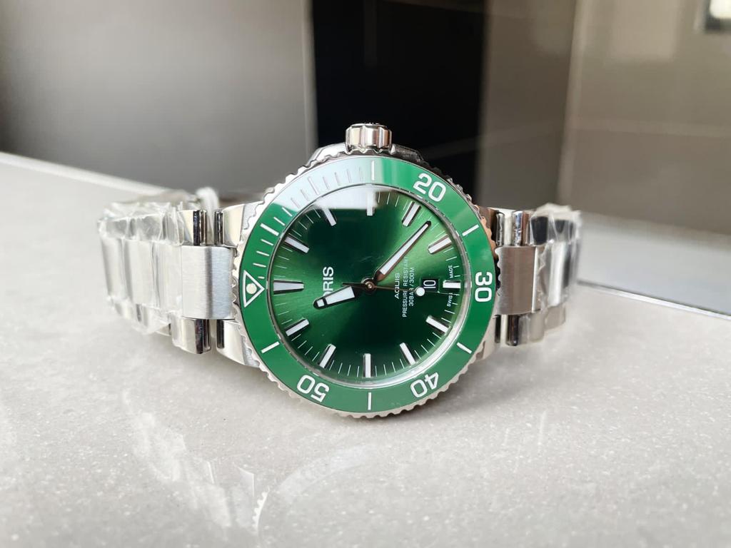 ORIS AQUIS green face CERAMIC bezel SW200 SWISS movement Wow Watches