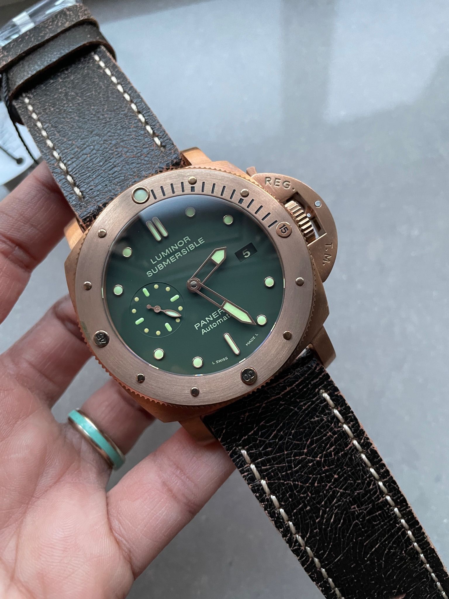 PAM382 N Bronzo VSF 1 1 Best Edition on Green dial on Brown